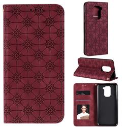 Intricate Embossing Four Leaf Clover Leather Wallet Case for Xiaomi Redmi Note 9 - Claret