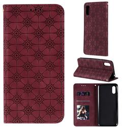 Intricate Embossing Four Leaf Clover Leather Wallet Case for Xiaomi Redmi 9A - Claret