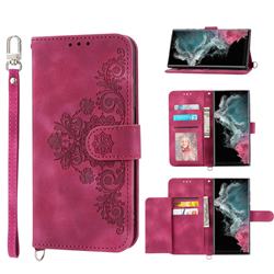 Skin Feel Embossed Lace Flower Multiple Card Slots Leather Wallet Phone Case for Samsung Galaxy S22 Ultra - Claret Red