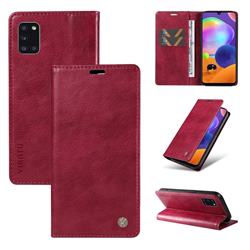 YIKATU Litchi Card Magnetic Automatic Suction Leather Flip Cover for Samsung Galaxy A31 - Wine Red