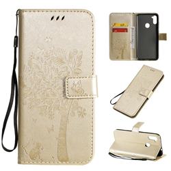 Embossing Butterfly Tree Leather Wallet Case for Samsung Galaxy M11 - Champagne