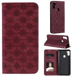 Intricate Embossing Four Leaf Clover Leather Wallet Case for Samsung Galaxy M11 - Claret