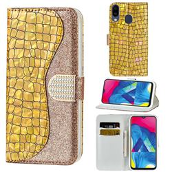 Glitter Diamond Buckle Laser Stitching Leather Wallet Phone Case for Samsung Galaxy M20 - Gold