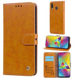 Luxury Retro Oil Wax PU Leather Wallet Phone Case for Samsung Galaxy M20 - Orange Yellow