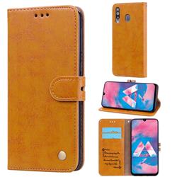 Luxury Retro Oil Wax PU Leather Wallet Phone Case for Samsung Galaxy M30 - Orange Yellow