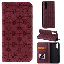 Intricate Embossing Four Leaf Clover Leather Wallet Case for Sony Xperia 10 II - Claret